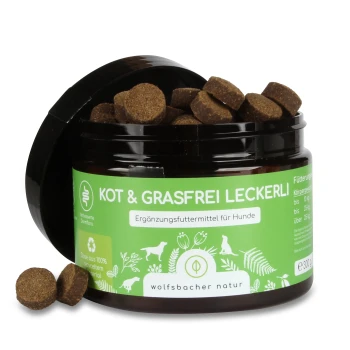 Braune Hundeleckerlis in einem schwarzen Glas mit grünem Etikett, beschriftet mit "KOT & GRASFREI LECKERLI," für Hunde, 300g.