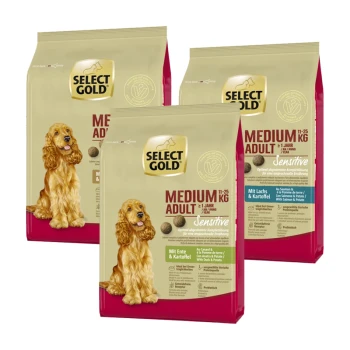 Drei Säcke Select Gold Hundefutter für mittelgroße erwachsene Hunde, mit Geschmacksrichtungen wie Ente und Kartoffel sowie Lachs und Kartoffel.