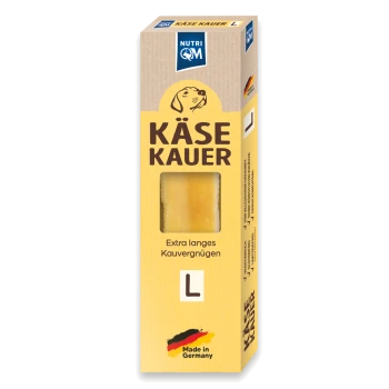 Nutri QM Käse Kauer Hundekau-Box (Größe L) mit sichtbarem Kauknochen, Text „Extra langes Kauvergnügen“ und „Hergestellt in Deutschland“.