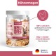 Bild von Haustierfutter mit rohen Hühnermägen, beschriftet mit '100% Hühnermagen', mit '0g' Zucker und 'Ideal für Training & Belohnung.'