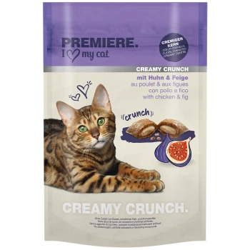 Eine Bengal-Katze ruht neben einem Beutel "Premiere I ❤️ meine Katze" Hühner- und Feigen-Cremeknabbereien.