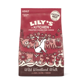 Adult Duck, Salmon and Venison 7 kg A bag of Lily's Kitchen dog food with a whimsical dog illustration, labeled "Wild Woodland Walk," featuring duck, salmon, and venison.