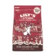 A bag of Lily's Kitchen dog food with a whimsical dog illustration, labeled "Wild Woodland Walk," featuring duck, salmon, and venison.