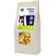 Eine Tüte Blue Tree Wellness Flakes für Haustiere, mit einem Hund und als vitaminreiche Mischung mit Zucchini, Petersilie und Kürbis beschriftet.