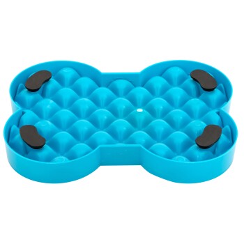 Blauer, knochenförmiger Slow-Feeder-Hundenapf mit erhabenen Noppen und vier schwarzen Gummigriffen an der Unterseite.