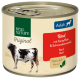 Dose Hundefutter, beschriftet mit "Real Nature Original" mit Rindfleisch, Kartoffeln und schwarzem Kreuzkümmelöl. Mit einer Illustration einer Kuh.