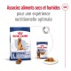 Emballage de nourriture pour chiens Royal Canin présentant de la nourriture sèche dans un grand sac et de la nourriture humide en conserve, promouvant une nutrition optimale en combinant les deux.