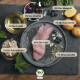 Rohes Putenfleisch (80% Bio-Pute) auf einem Teller mit Kartoffeln, Beeren und Öl; deutsche Kennzeichnungen 'Für Hunde' und BIO-Logo.