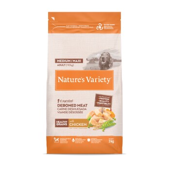 Sac de nourriture Nature's Variety pour chiens, Medium/Maxi Adulte (+10 kg), viande désossée au poulet, céréales saines, 3 kg, photo de chien.