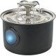 Fontaine à eau cylindrique noire pour animaux avec dessus en acier inoxydable et bec en forme de fleur à trois jets, LED bleu sur le côté.