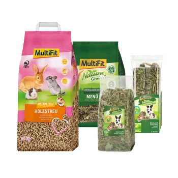 Vier MultiFit Haustierprodukte: 11 kg rosa Holzstreu, grünes getreidefreies Kaninchenmenü, 300 g Löwenzahn und Petersiliensticks.