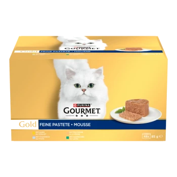 Purina Gourmet Gold Schachtel: weiße langhaarige Katze und ein Teller mit Mousse-Pâté; sichtbarer Text „GOURMET“ und „FEINE PASTETE • MOUSSE“.