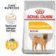 Royal Canin Dermacomfort Medium dog food bag featuring a Shar Pei, highlighting reduced allergen formula and 91% owner satisfaction.