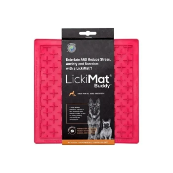 Bright pink LickiMat Buddy for dogs, featuring a textured surface for spreading treats, with text highlighting stress relief benefits.