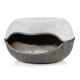 Ein gemütliches, rundes Haustierbett aus grauem Filz mit einem weichen, weißen Futter, teilweise geöffnet, um das plüschige Innenfutter zu zeigen.
