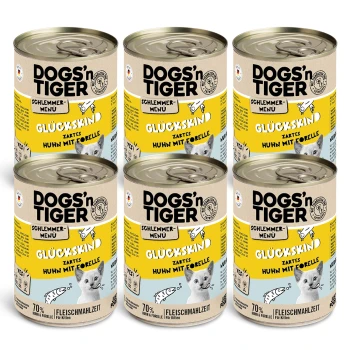 Sechs Dosen DOGS'n TIGER Katzenfutter, beschriftet mit "GLÜCKSKIND", mit zartem Hähnchen und Forelle, 70 % Fleischgehalt und einer verspielten Kätzchen-Grafik.
