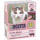 Katzenfutterverpackung mit dem Gesicht einer Katze und dem Text: "89 % tierischen Ursprungs," "Frisches Menü," und "Grasgefüttertes Rindfleisch."