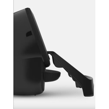 Schwarzes Haustierpflegewerkzeug mit einem gebogenen Griff und einer strukturierten Basis, entworfen für einfache Handhabung und Komfort.