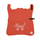 Ein orangefarbener Haustier-Schürze mit einem weißen gestickten Hundedesign und dem Markennamen 'Barkalot', mit verstellbaren Trägern und einer Tasche.