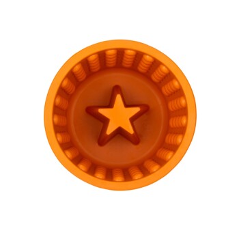 Orangefarbene Futterschüssel für Haustiere mit einem sternförmigen Zentrum und strukturiertem Rand, von oben betrachtet.