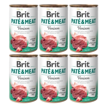 Sechs Dosen Brit Paté & Meat, mit dem Etikett "Wild", mit Bildern von Fleisch- und Innereien, die als getreidefrei, sojafrei und gentechnikfrei beworben werden.