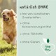 Ein fröhlicher Golden Retriever läuft auf einem grasbewachsenen Feld mit dem Text: "Keine künstlichen Zusatzstoffe, Konservierungsmittel, Füllstoffe; glutenfrei, 100% natürlich."