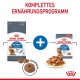 Royal Canin Light Weight Katzenfutterverpackung mit Trockenfutter und Nassfutter auf einem Teller, beschriftet mit "Komplettes Ernährungsprogramm."