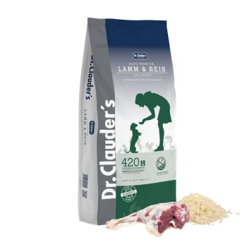 Dr. Clauder's High Premium Lamm & Reis Hundefutterbeutel, mit einer Silhouette einer Person, die einen Hund füttert, mit einem rohen Lammknochen und Reiskörnern davor.
