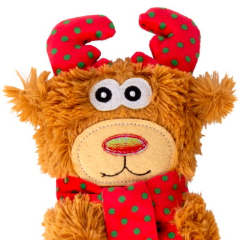 Plush brown dog toy with red and green polka dot antlers and scarf, large eyes, and stitched nose and mouth.