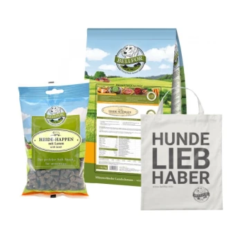 Eine Ausstellung von Haustierprodukten: "Heide-Happen mit Lamm" Hundeleckerlis, Premium-Hundefutterbox und eine Tragetasche mit der Aufschrift "HUNDE LIEB HABER."