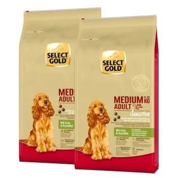 Zwei Tüten Select Gold Hundefutter für mittelgroße erwachsene Hunde, gekennzeichnet mit "Sensibel" mit Ente und Kartoffel, geeignet für Hunde von 11-25 kg.