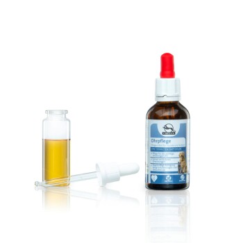 Ohrpflege-Lösung für Hunde und Katzen in einer braunen Flasche mit Pipette, neben einem kleinen Glasgefäß mit Flüssigkeit.