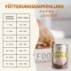 Poster 'Fütterungsempfehlung - Puppy/Junior' mit Gewicht-zu-Gramm-Tabelle und Dose Wildfang 'Huhn Pur'.