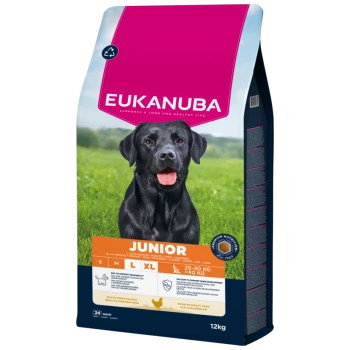 Sac d'aliments pour chiens Eukanuba, haut rose, photo d'un Labrador noir, bandeau orange « JUNIOR », textes « EUKANUBA » et « 12 kg » visibles