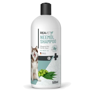 Flasche mit REAVET Neemöl-Shampoo für Hunde, mit einer Husky-Illustration, pH 7.0, 500 ml und deutschem Text zur Haut- und Fellpflege.