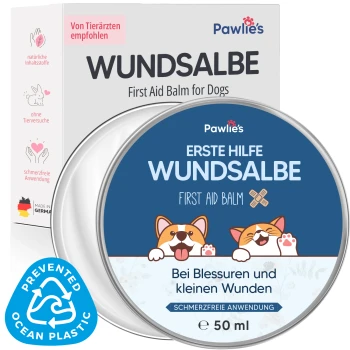 Pawlie's Erste-Hilfe-Balsam für Hunde in einer 50 ml Dose mit Cartoon-Hunden und Text: "WUNDsalbe", "First Aid Balm" und "Bei Blessuren."