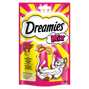 Emballage de friandises pour chats Dreamies Mix, mettant en vedette un chat joueur, avec un texte soulignant l'intérieur crémeux et l'extérieur croustillant, 60g.