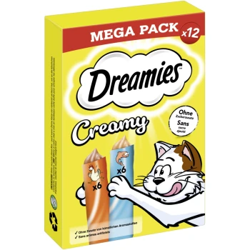 Żółte pudełko oznaczone "Dreamies Creamy Mega Pack x12" z tubkami przysmaków z kurczaka i ryby; rysunkowy kot sięga po nie. Bez sztucznych aromatów.