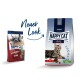 Zwei Happy Cat-Futterbeutel: links beschriftet "adult volpern-rind", rechts "Culinary 1+ years" mit einer getigerten Katze und dem Text "Neuer Look".