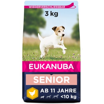 Sac de nourriture pour chien Eukanuba Senior, 3 kg, adapté aux chiens de plus de 11 ans et de moins de 10 kg, avec un chien sautant sur un fond herbeux.