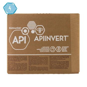 Karton mit der Aufschrift "API APIINVERT" mit einem Bienen-Symbol, das 16 kg Produkt enthält und mehrsprachige Nährwertinformationen bietet.