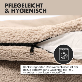 Nahaufnahme eines Haustierbettes mit einem Reißverschlussbezug, mit dem Text "Pflegeleicht & hygienisch" und Anweisungen zum Maschinenwaschen bei 30°C.