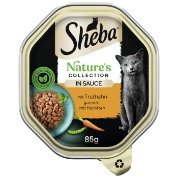 Karma dla kotów Sheba Nature's Collection w sosie, z indykiem i marchewką, opakowanie 85g z obrazem szarego kota i zielonym logo.
