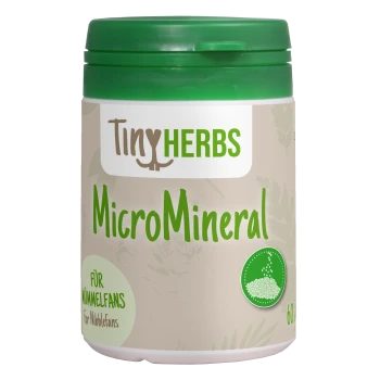 Behälter mit Tiny Herbs MicroMineral für kleine Haustiere, mit grünem Deckel, beigem Hintergrund und Text in Deutsch und Englisch.