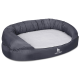 Ein gemütliches, graues Haustierbett mit einem plüschigen weißen Innenraum und erhöhten Rändern, mit dem Logo 'KNUFFELWUFF' an der Seite.