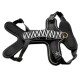 Schwarz-weiße gemusterte Hundegeschirr mit verstellbaren Riemen und einem metallischen D-Ring zur Leinenbefestigung.