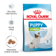 Opakowanie Royal Canin Puppy X‑Small 2–10 miesięcy, karma dla szczeniąt; białe/niebieskie opakowanie ze zdjęciem małego szczeniaka i oznaczeniem "3 Stage".