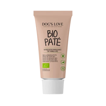 Pâté de foie bio pour chiens dans un tube beige, étiqueté "DOG'S LOVE BIO PATÉ," avec un texte soulignant qu'il s'agit d'une friandise naturelle pour l'entraînement et le jeu.