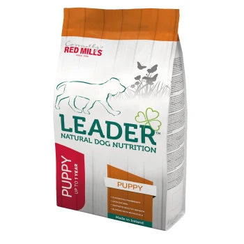 A bag of Leader Natural Dog Nutrition puppy food with a dog silhouette and "PUPPY" and "Chicken No. 1 Ingredient" text. Made in Ireland.