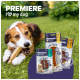 Trawiasta sceneria na zewnątrz z trzema opakowaniami przysmaku dla psów PREMIERE Chew Snack, z wyraźnym napisem "PREMIERE I ❤️ mojego psa".